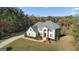 Two-story house with a large backyard and wooded area at 2202 Escalade Ct, Conyers, GA 30094