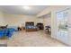 Spacious basement bedroom with two twin beds and access to backyard at 2202 Escalade Ct, Conyers, GA 30094