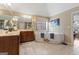 Bathroom boasts a corner soaking tub and double vanity at 2202 Escalade Ct, Conyers, GA 30094