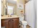 Clean bathroom with shower/tub combo and wood vanity at 2202 Escalade Ct, Conyers, GA 30094