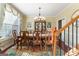 Formal dining room with a large table and chandelier at 2202 Escalade Ct, Conyers, GA 30094