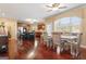 Bright dining room with hardwood floors and access to kitchen at 2202 Escalade Ct, Conyers, GA 30094