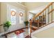 Elegant entryway with double doors and a view of the dining room at 2202 Escalade Ct, Conyers, GA 30094