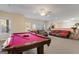 Basement recreation area with pool table and comfortable seating at 2202 Escalade Ct, Conyers, GA 30094