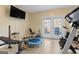 Well-equipped home gym featuring exercise machines and weights at 2202 Escalade Ct, Conyers, GA 30094