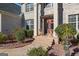 Two-story house with a brick facade and a grand entrance at 2202 Escalade Ct, Conyers, GA 30094