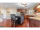 Modern kitchen with island, stainless steel appliances, and hardwood floors at 2202 Escalade Ct, Conyers, GA 30094