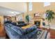 Spacious living room with fireplace, hardwood floors, and high ceilings at 2202 Escalade Ct, Conyers, GA 30094