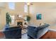 Spacious living room with fireplace, hardwood floors, and high ceilings at 2202 Escalade Ct, Conyers, GA 30094