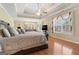 Main bedroom with hardwood floors and large windows at 2202 Escalade Ct, Conyers, GA 30094