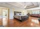 Spacious main bedroom with hardwood floors and sitting area at 2202 Escalade Ct, Conyers, GA 30094