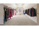 Large walk-in closet with ample hanging space and shelving at 2202 Escalade Ct, Conyers, GA 30094