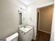 Vanity area with granite countertop and white cabinets at 6235 Creekford Ln, Lithonia, GA 30058