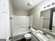 Bathroom featuring granite vanity, tub, and shower at 6235 Creekford Ln, Lithonia, GA 30058