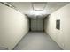Attached garage with overhead door and ample space at 6235 Creekford Ln, Lithonia, GA 30058