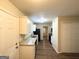 Open concept kitchen with granite countertops and stainless steel appliances at 6235 Creekford Ln, Lithonia, GA 30058
