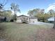 Ranch home with large backyard and patio area at 7125 Rhodes St, Lithonia, GA 30058