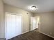 Well-lit bedroom featuring a large closet at 7125 Rhodes St, Lithonia, GA 30058