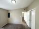 Bedroom with closet and access to another room at 7125 Rhodes St, Lithonia, GA 30058