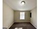 Bright bedroom with window and neutral walls at 7125 Rhodes St, Lithonia, GA 30058