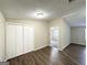 Spacious bedroom with double door closet and hardwood floors at 7125 Rhodes St, Lithonia, GA 30058