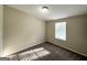 Simple bedroom with a window and carpet at 7125 Rhodes St, Lithonia, GA 30058