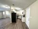 Modern kitchen with stainless steel appliances and granite countertops at 7125 Rhodes St, Lithonia, GA 30058