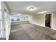 Bright sunroom with large windows offering backyard access at 7125 Rhodes St, Lithonia, GA 30058
