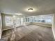 Sunroom with wall-to-wall windows, providing plenty of natural light at 7125 Rhodes St, Lithonia, GA 30058