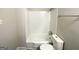 Simple bathroom featuring a white bathtub and toilet at 2370 Tiffany Cir, Decatur, GA 30035