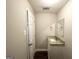 Simple bathroom with granite vanity and mirrored medicine cabinet at 2370 Tiffany Cir, Decatur, GA 30035