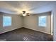 Spacious bedroom with ceiling fan, neutral walls, and carpet flooring at 2370 Tiffany Cir, Decatur, GA 30035