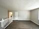 Spacious living room with hardwood floors and staircase at 2370 Tiffany Cir, Decatur, GA 30035