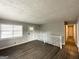Living room with hardwood floors and hallway view at 2370 Tiffany Cir, Decatur, GA 30035