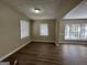 Bright dining area with hardwood floors and neutral walls at 2413 Ben Hill Rd, East Point, GA 30344