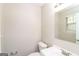 Clean bathroom with a toilet, sink, and bathtub at 215 Shadow Wood Dr, Douglasville, GA 30134