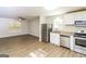 Modern kitchen with stainless steel appliances and granite countertops at 215 Shadow Wood Dr, Douglasville, GA 30134