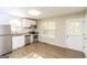 Modern kitchen with stainless steel appliances and granite countertops at 215 Shadow Wood Dr, Douglasville, GA 30134