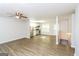 Open concept living and kitchen area with wood-look floors at 215 Shadow Wood Dr, Douglasville, GA 30134