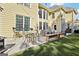 Spacious backyard patio with seating and fire pit at 2909 Everson Ridge Ct, Snellville, GA 30039