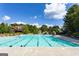 Large community pool with lap lanes and lounge chairs at 6857 Louis Dr, Locust Grove, GA 30248