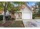 Cute ranch home with attached garage and small front yard at 167 London Dr, Mcdonough, GA 30253