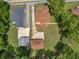 Aerial view showing house, detached garage, and large yard at 32 Peeksville Rd, Locust Grove, GA 30248