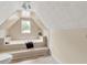 Bathroom featuring a large soaking tub and a window at 32 Peeksville Rd, Locust Grove, GA 30248