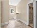 Bathroom with toilet, tile floor, and walk-in closet at 32 Peeksville Rd, Locust Grove, GA 30248