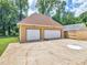 Two-car detached garage, offering ample parking at 32 Peeksville Rd, Locust Grove, GA 30248