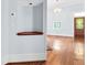Bright entryway with built-in shelving and hardwood floors at 32 Peeksville Rd, Locust Grove, GA 30248