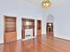 Living room with hardwood floors, fireplace and built-ins at 32 Peeksville Rd, Locust Grove, GA 30248
