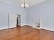 Living room featuring hardwood floors and fireplace at 32 Peeksville Rd, Locust Grove, GA 30248