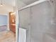 Shower with glass enclosure and built-in seat at 32 Peeksville Rd, Locust Grove, GA 30248